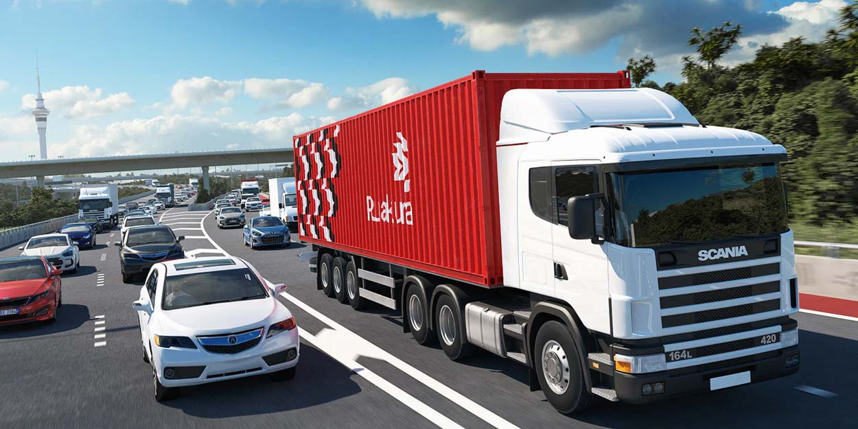 A Ruakura-branded truck on the Auckland motorway.